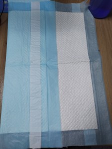 Factory competitive price adult underpad with soft surface quick absorbency incontinence pad with 2 long adhesive strips free sample